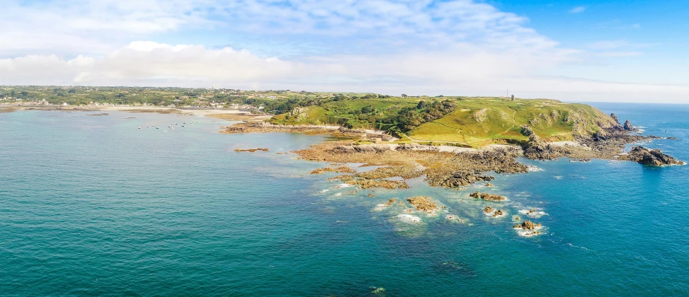 a aerial view of the island with a few other islands