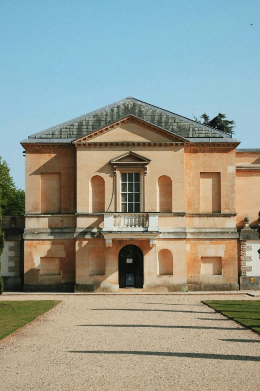 the entrance to a very large building with an elegant front entry