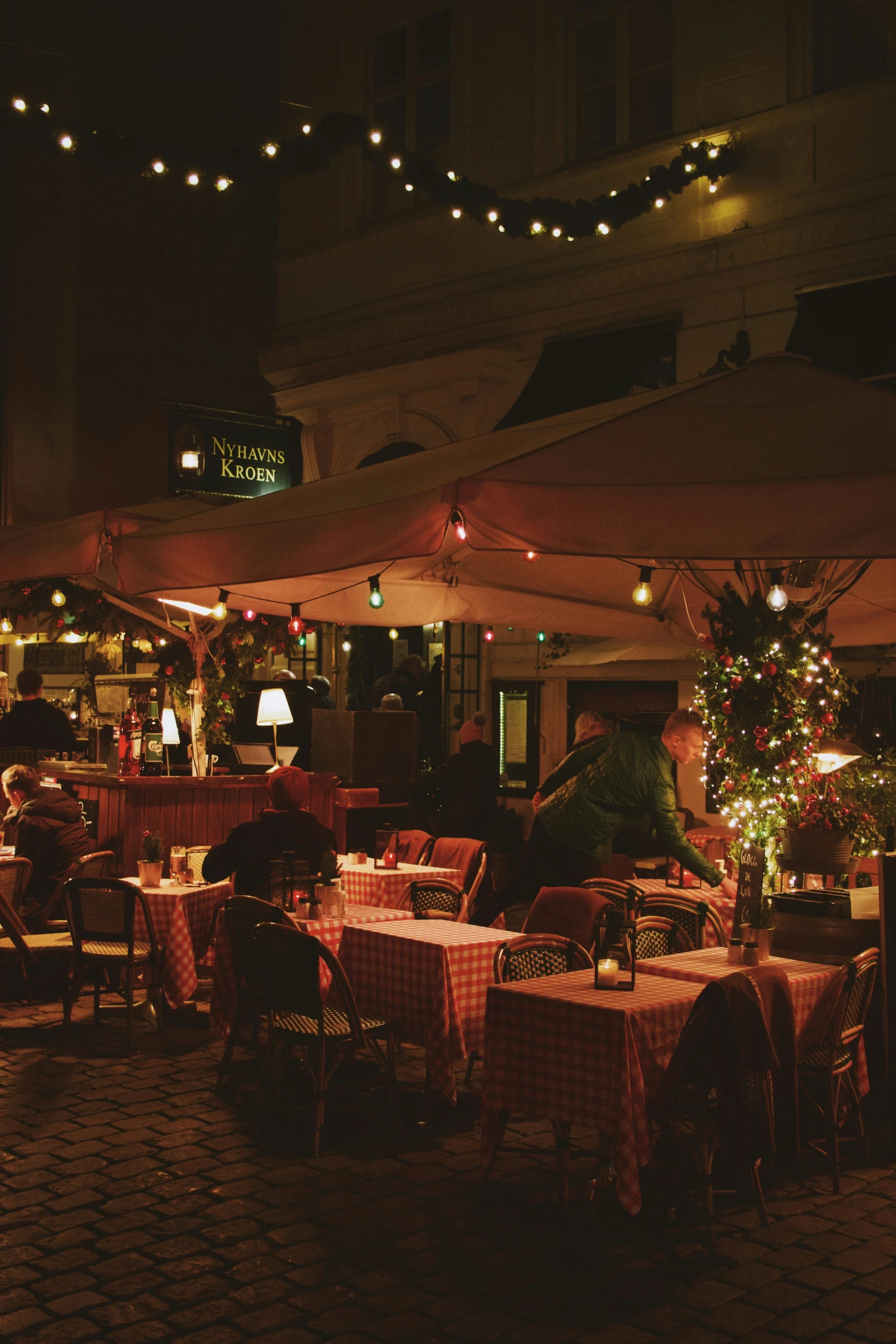 a large number of tables with many people seated