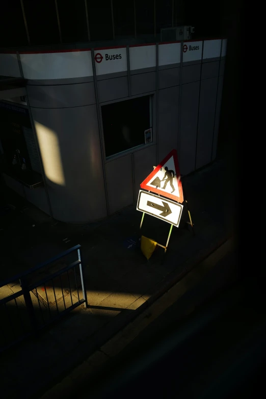 a street sign sitting on the side of a road