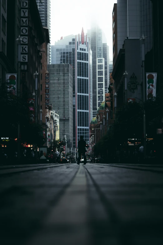 street with several large buildings and a long sidewalk