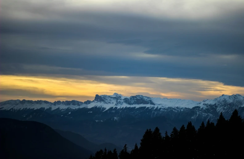 mountains that have snow on them during the day