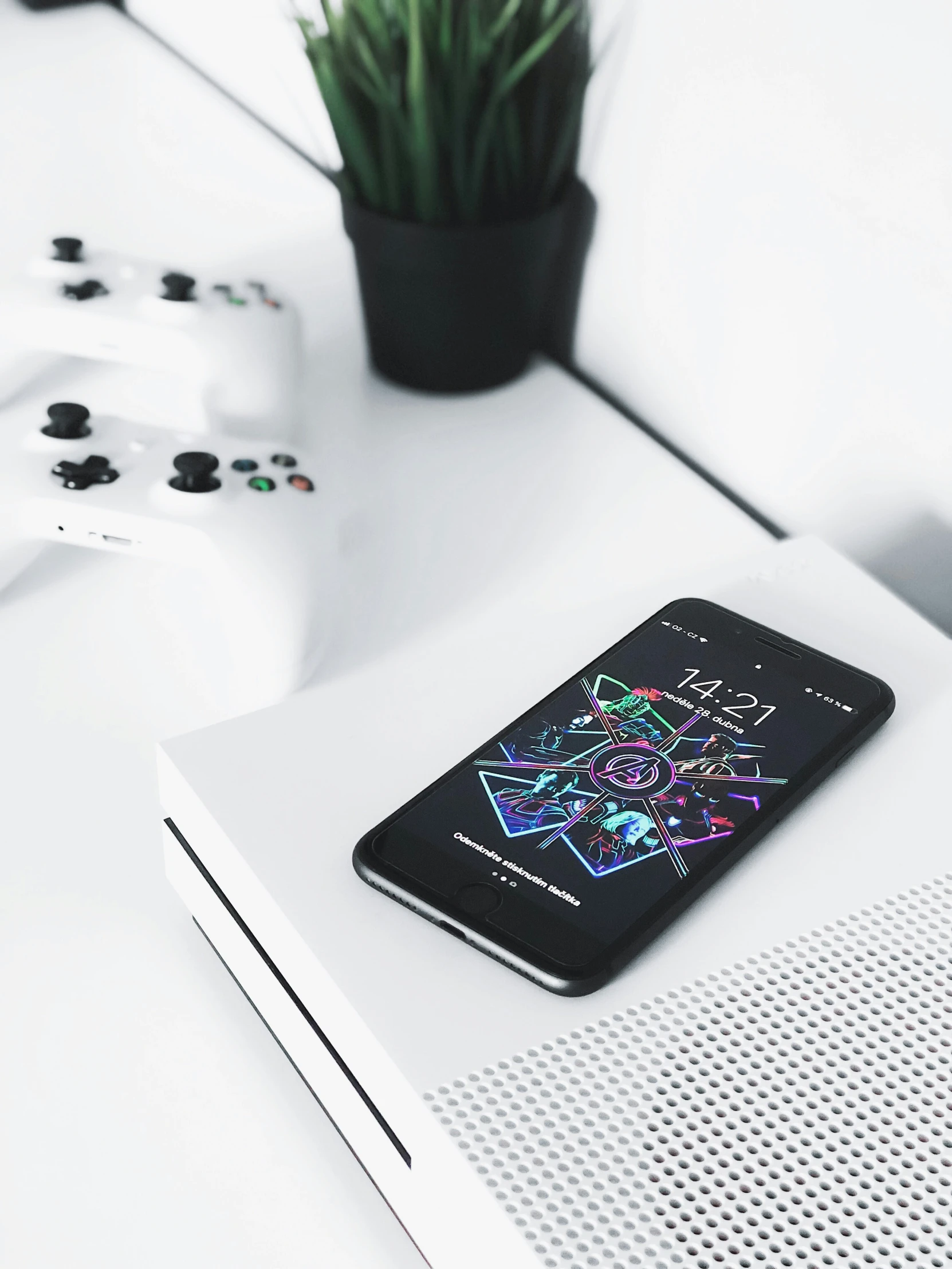 a cell phone and some dice on a table