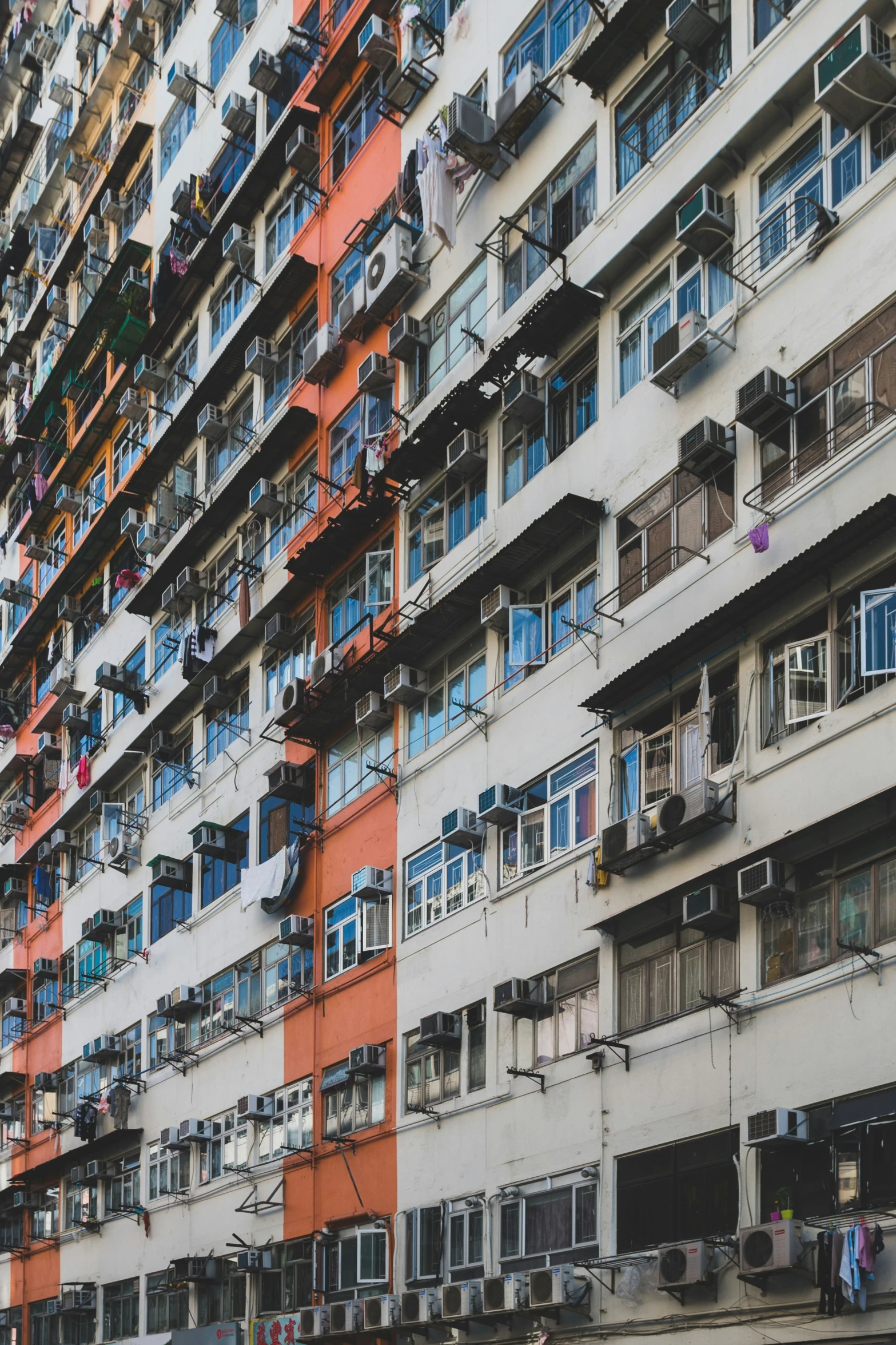 a big building with multiple balconies and window balconies