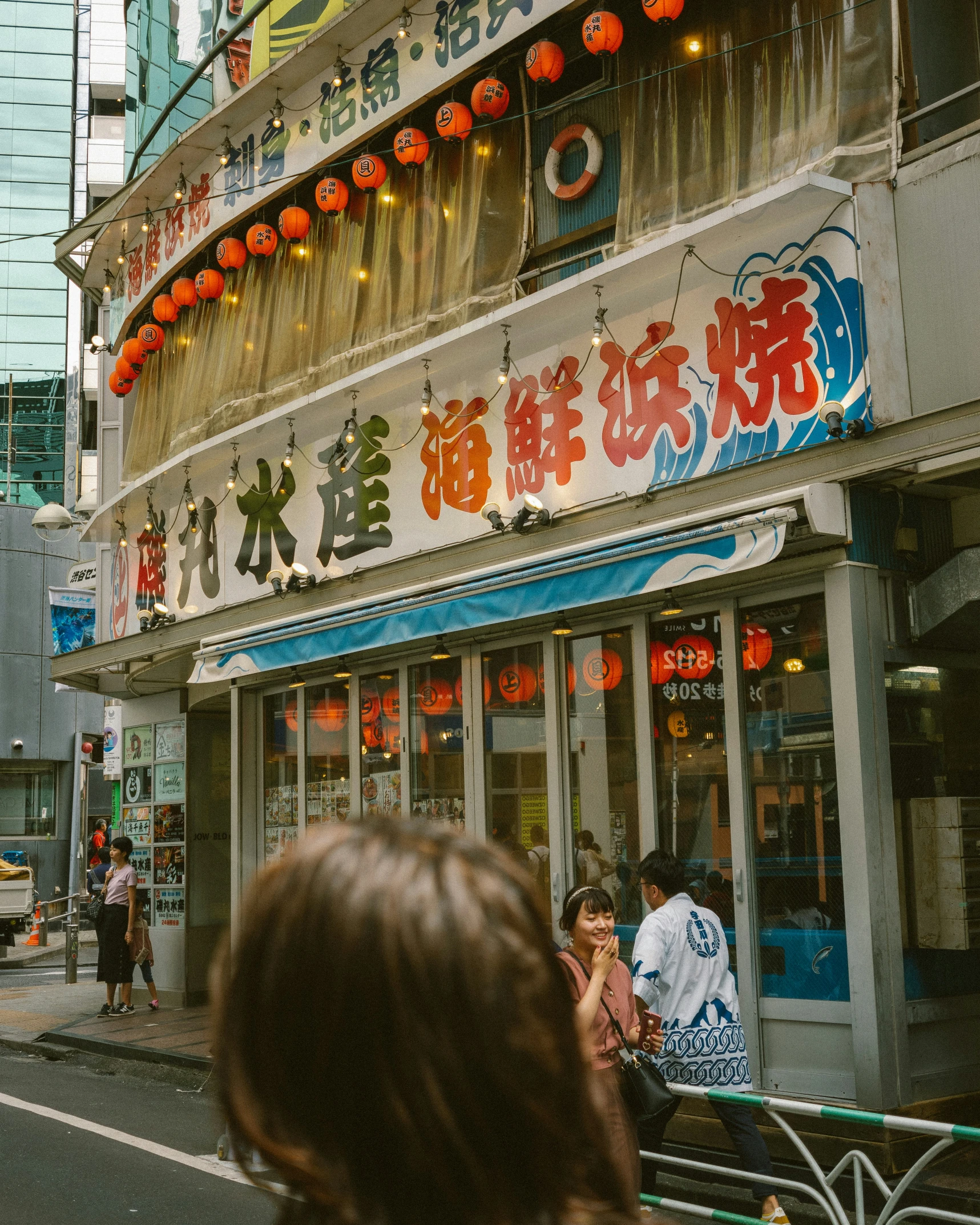 an asian restaurant is shown at the corner
