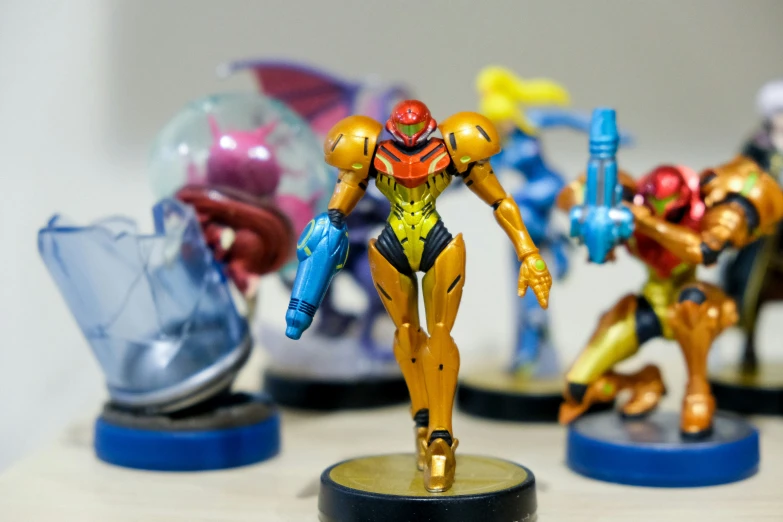 various toy figurines of different colors and sizes