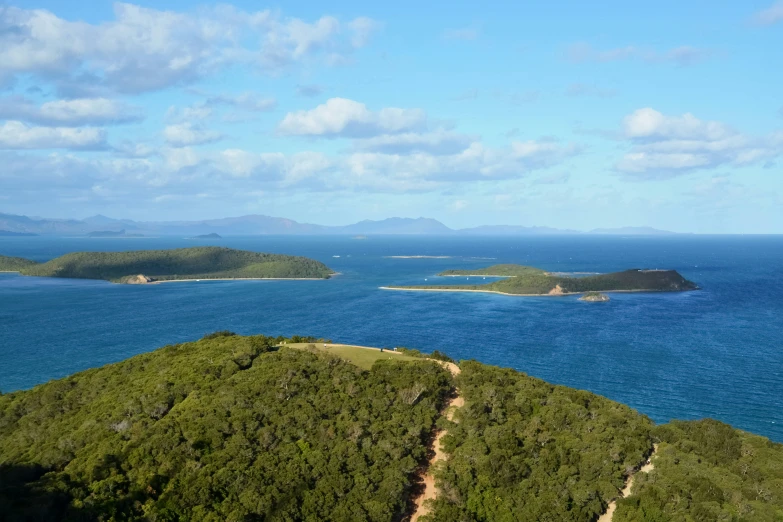 a small island off the coast in the ocean