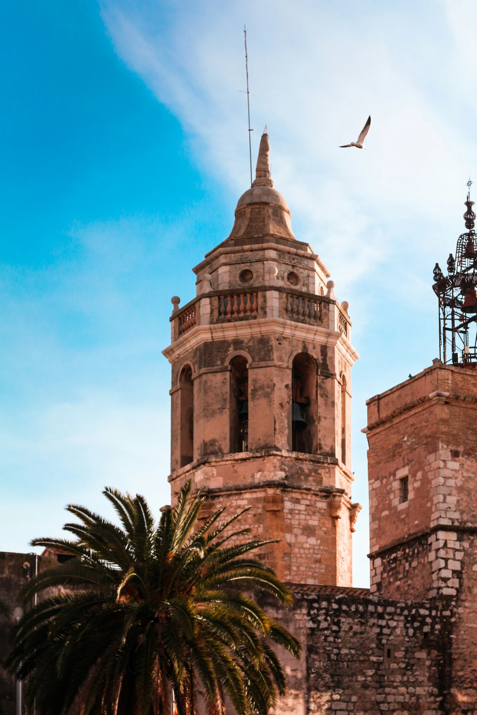 an old tower on top of a brick building