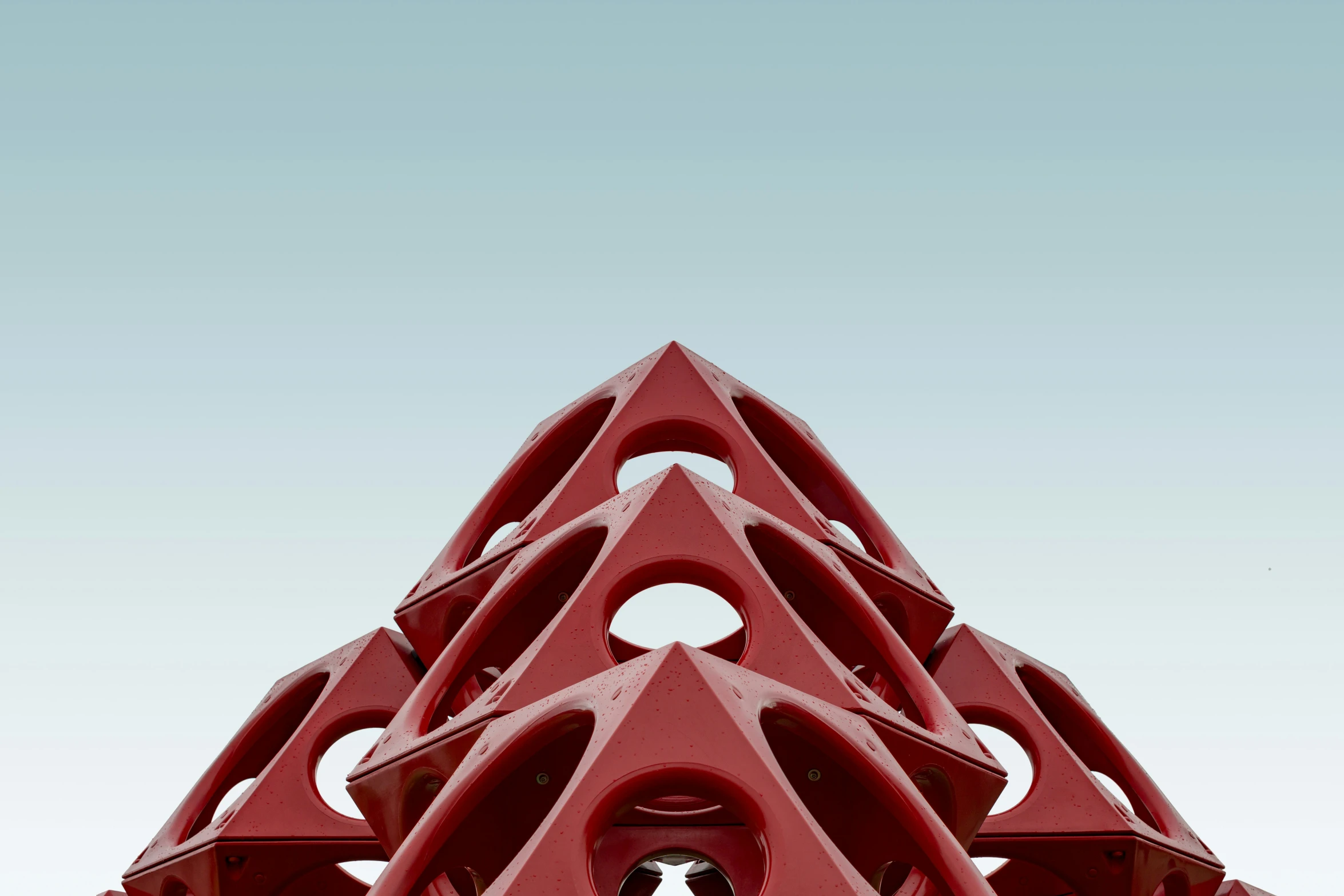 a bunch of red pyramids on top of each other