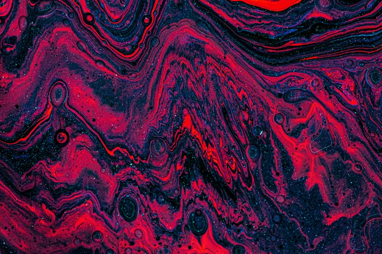 a red and blue fluid fluid surface