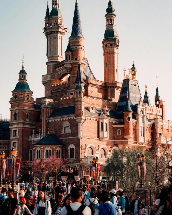 a tall building with many spires on top of it