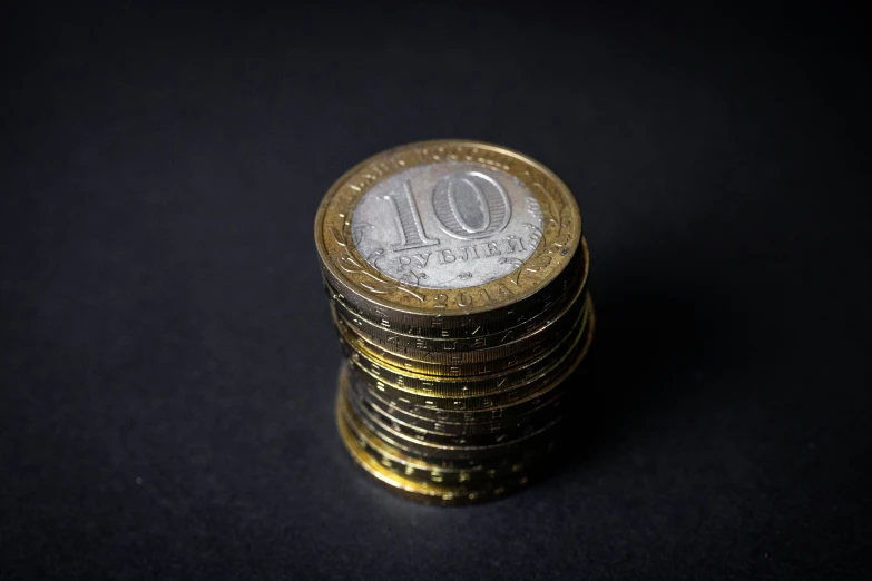 a stack of euro coins sitting on top of each other