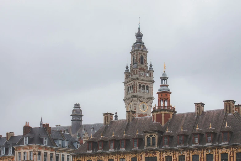 a view of many different buildings on a cloudy day