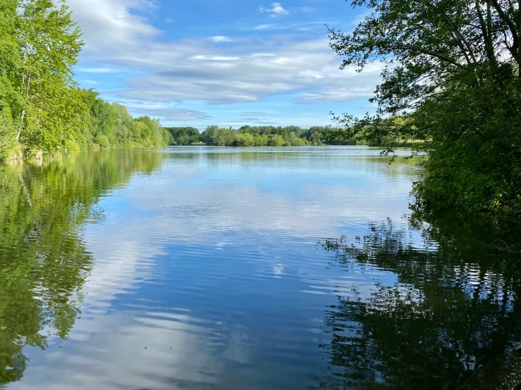 clouds float in the water, creating an illusion