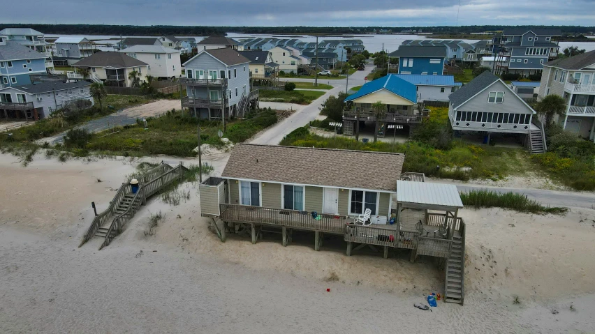 this aerial view shows a beach front with houses