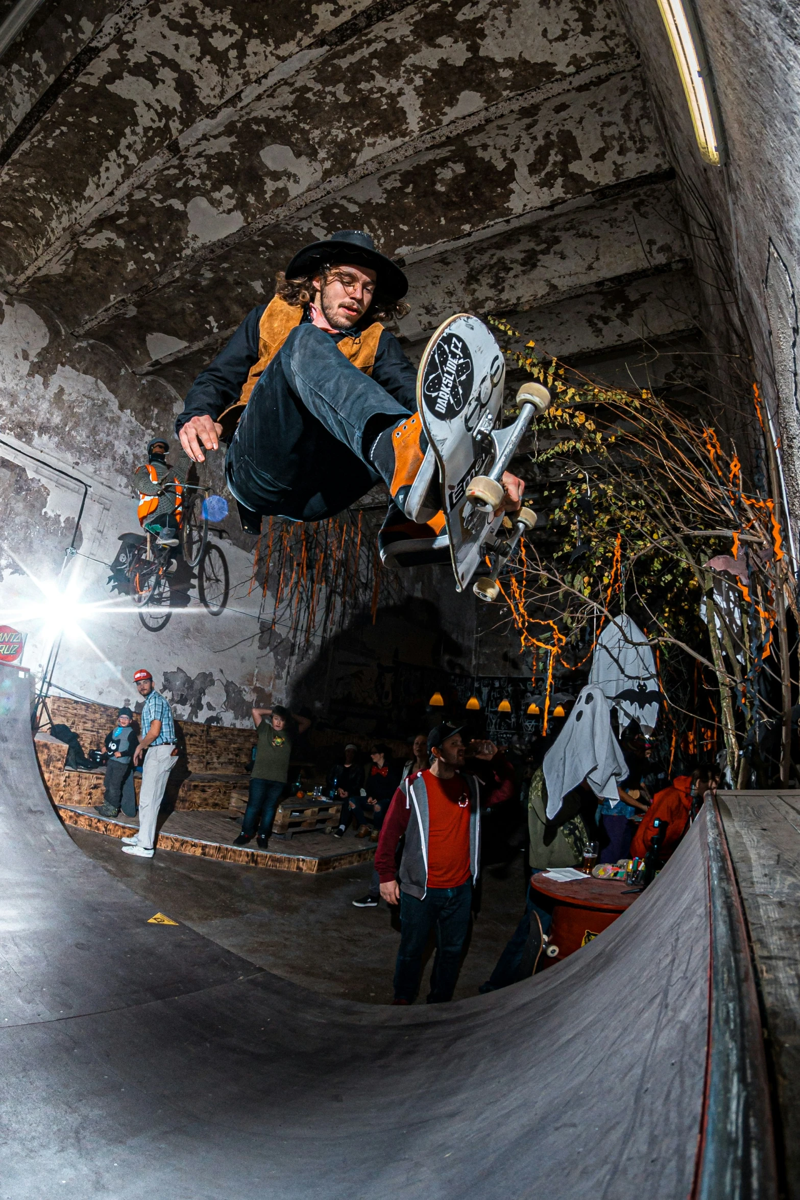 a person jumping over the top of a skateboard