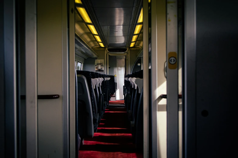 hallway with several rows of seats inside of it