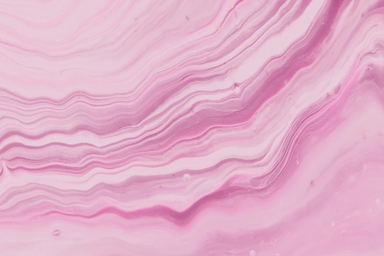a pink liquid painting texture with swirled layers