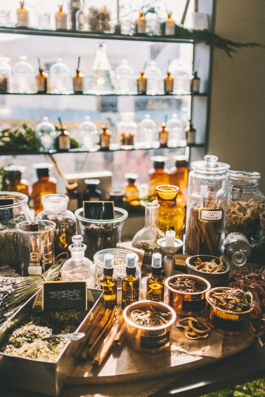 bottles and other items set out on an old wooden tray