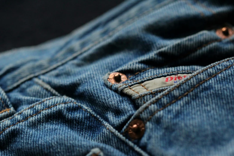 a pair of jeans that are in someones pocket