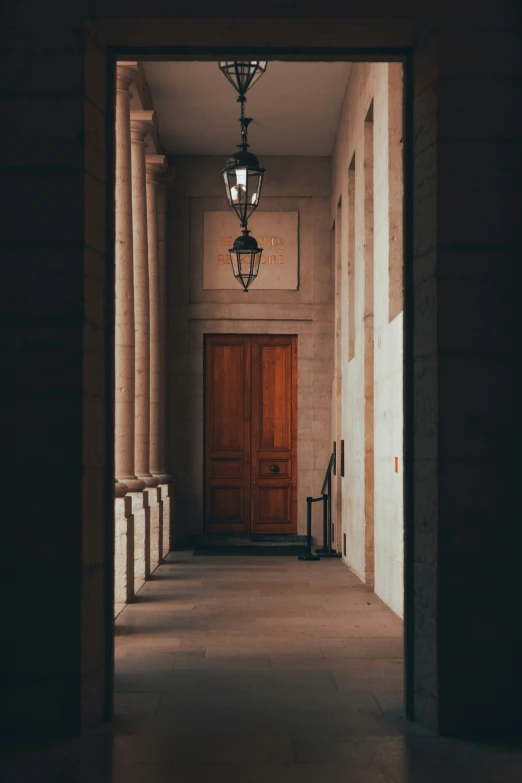 light shines on the wall and the floor as an entrance way