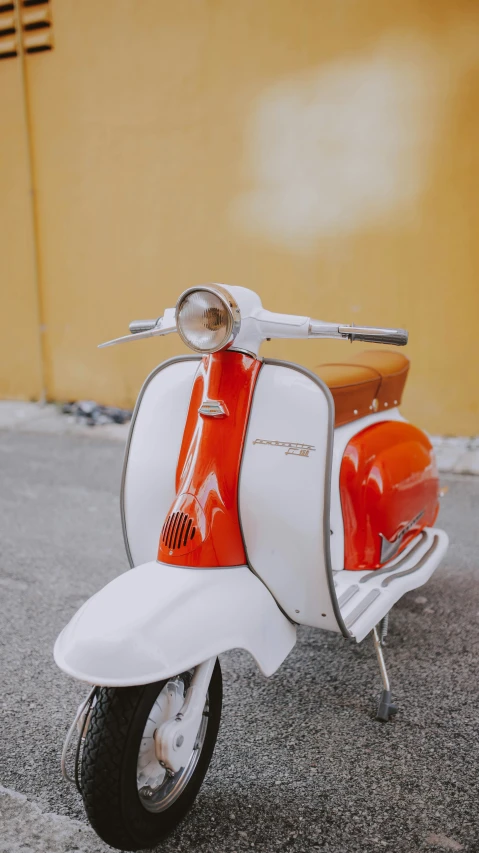 the rear wheel of an old scooter