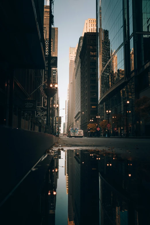 the reflection of buildings in the water is seen