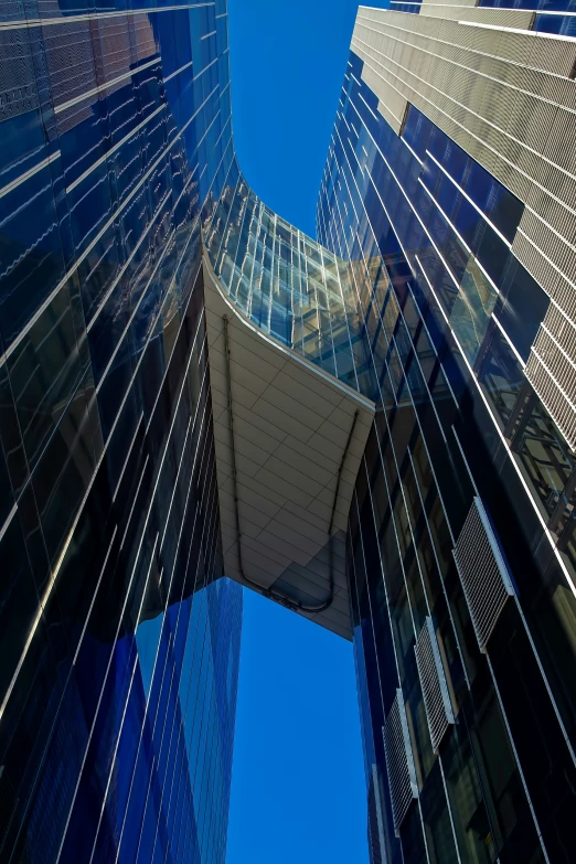 looking up at the top of tall buildings