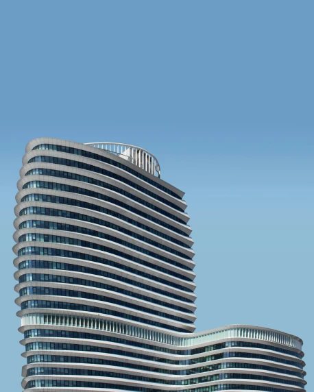 the front side of two tall buildings against a blue sky