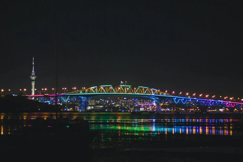 a bridge that is lit up at night
