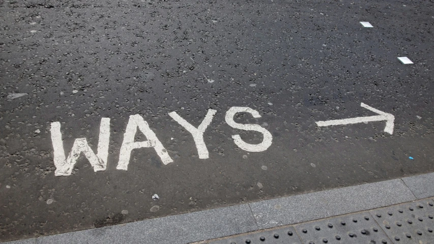 two way signs on the pavement indicating directions