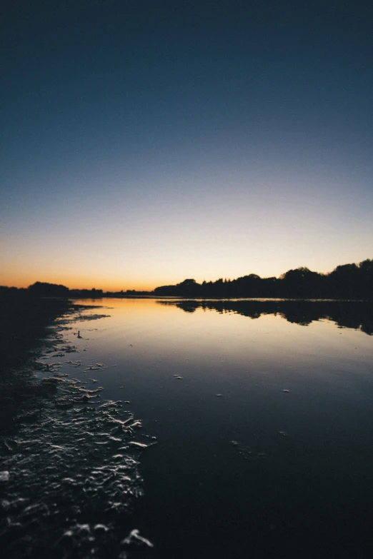 a lake that is very calm during the day