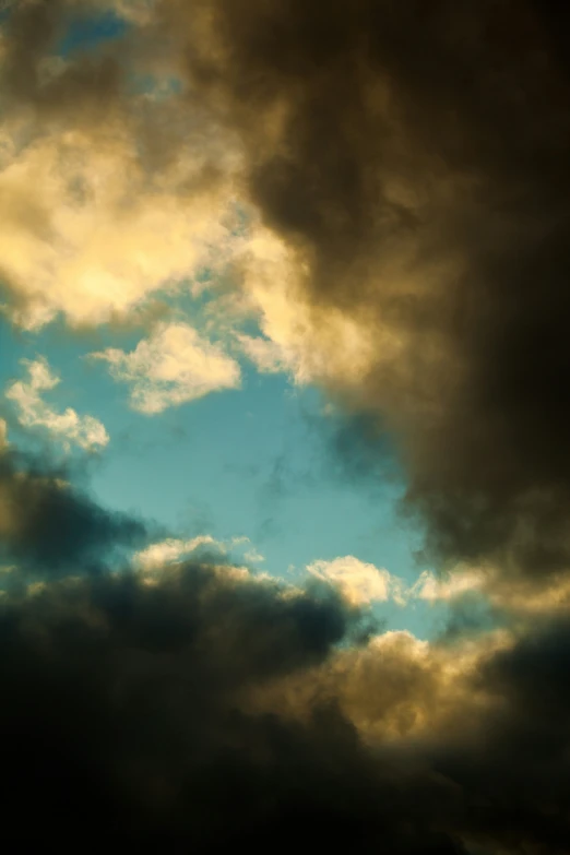 the clouds are covered in a green glow as the jet plane lands