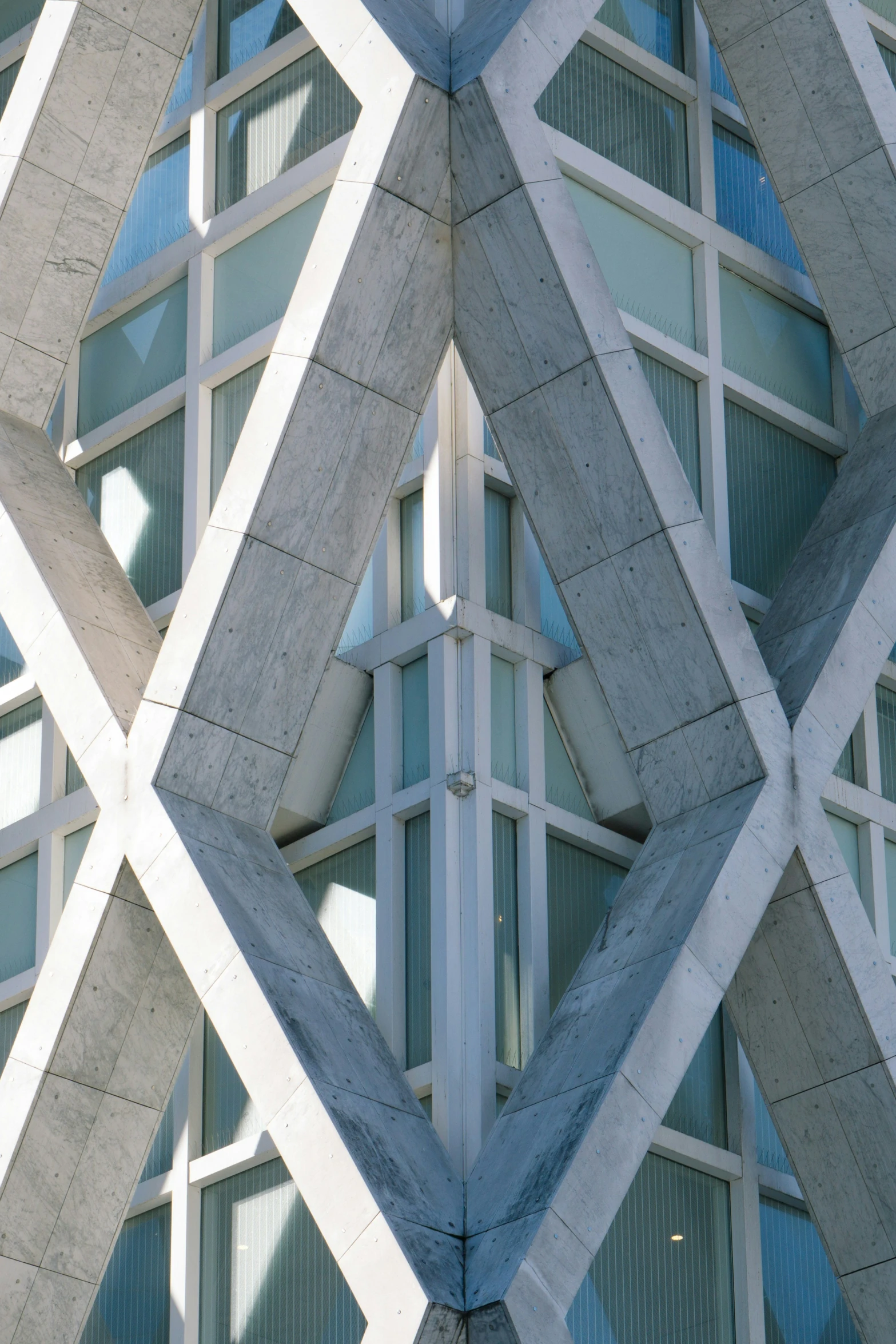 a close up of an architectural structure with blue windows