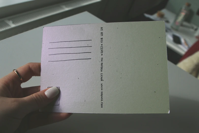 a small card has been placed to a person's chest