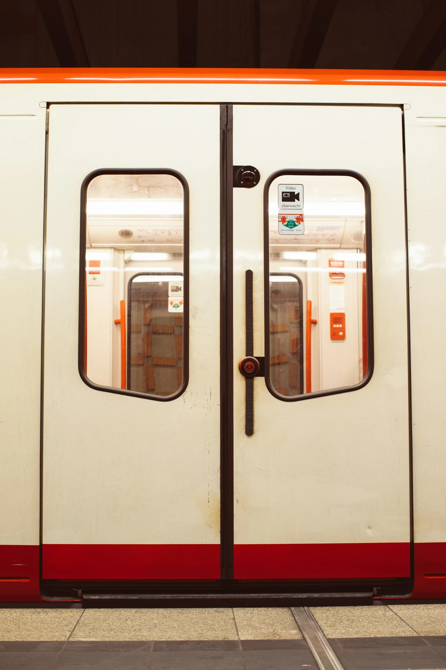 the door to a commuter train with the train number 1 on it