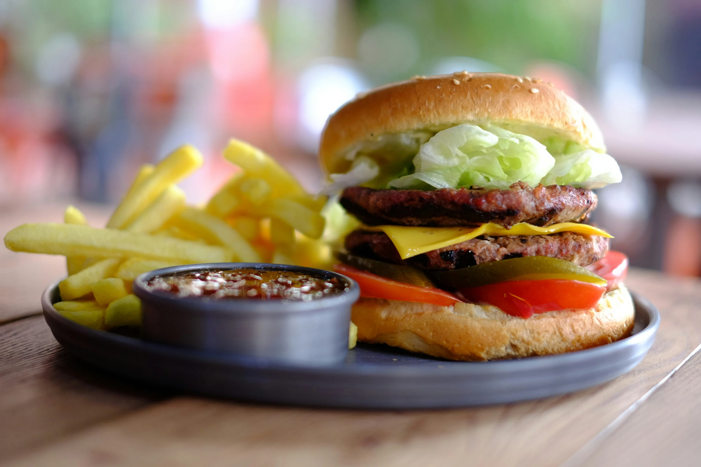 a hamburger and french fries are on a plate