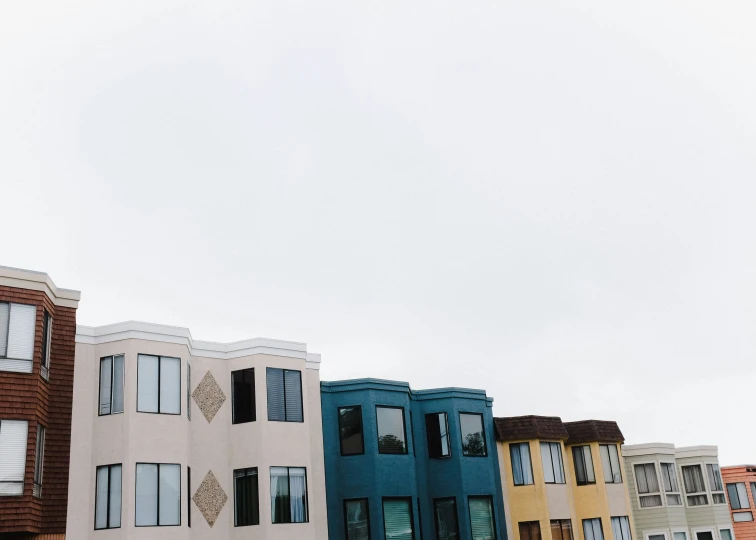 four different buildings are shown next to each other