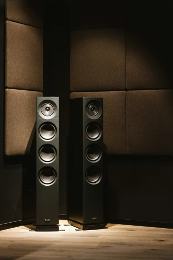 two speakers that are standing side by side