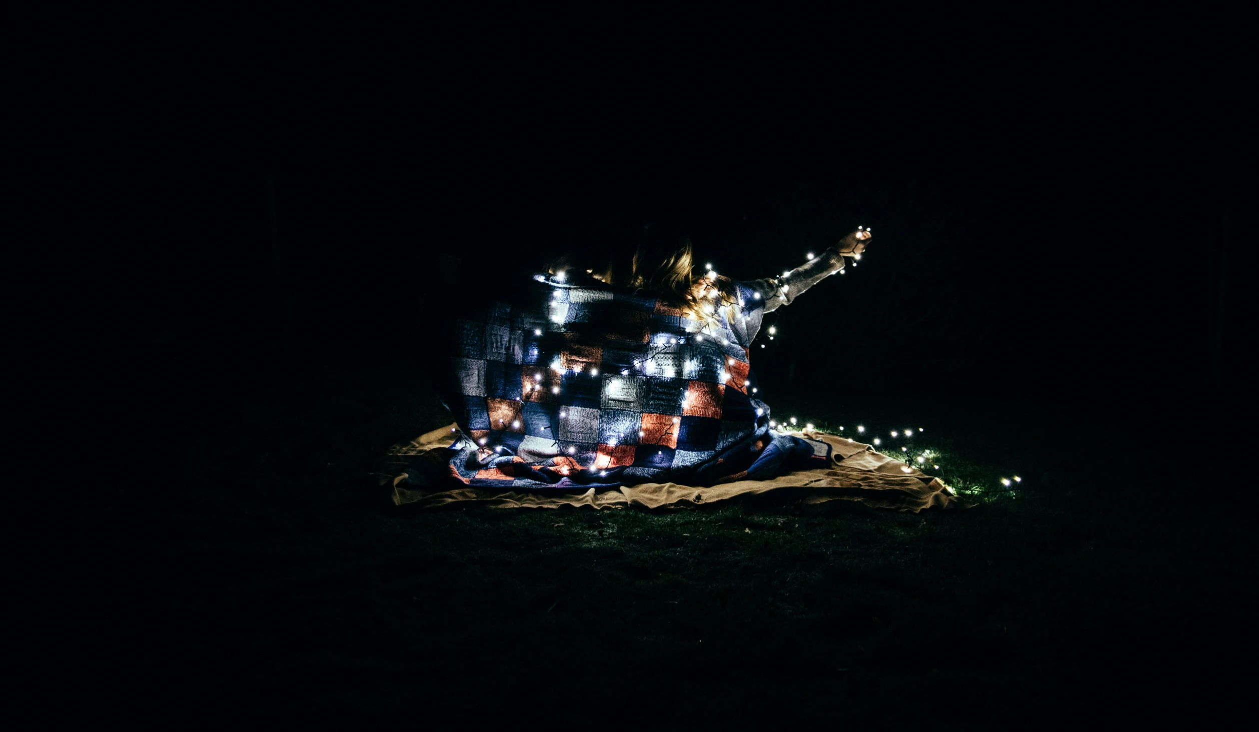 a large statue with decorations on it in the dark