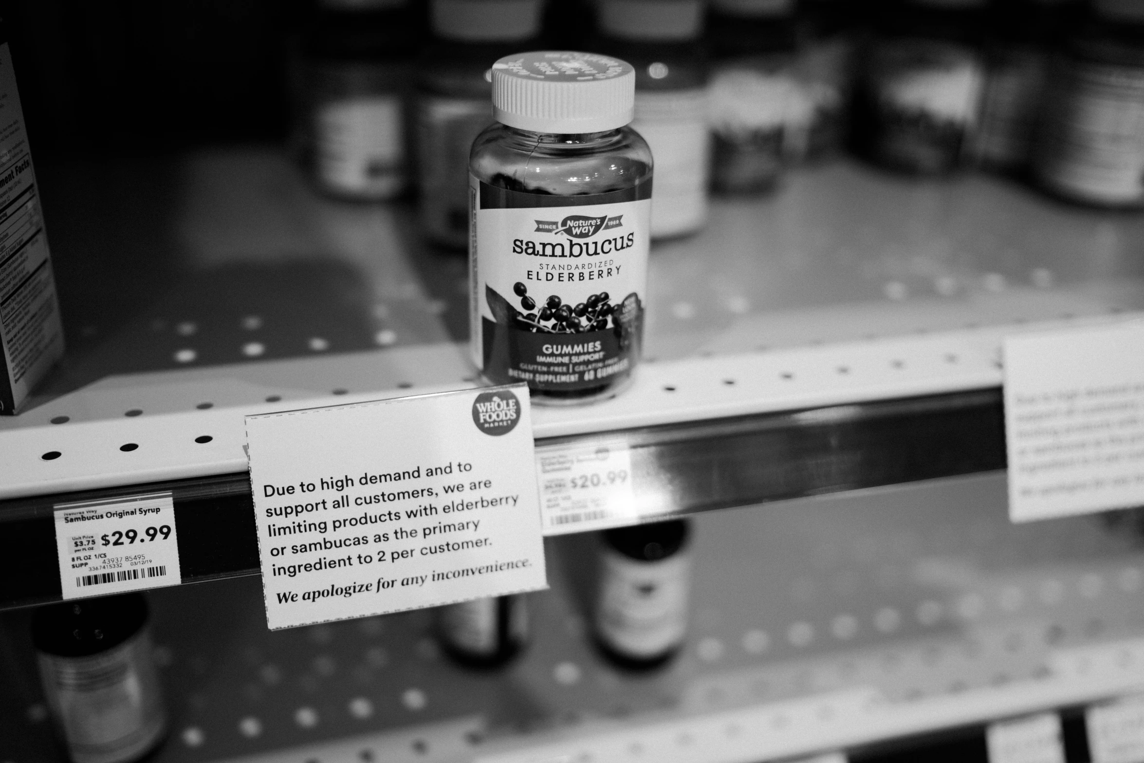 two medicine bottles are in a pharmacy pharmacy cabinet