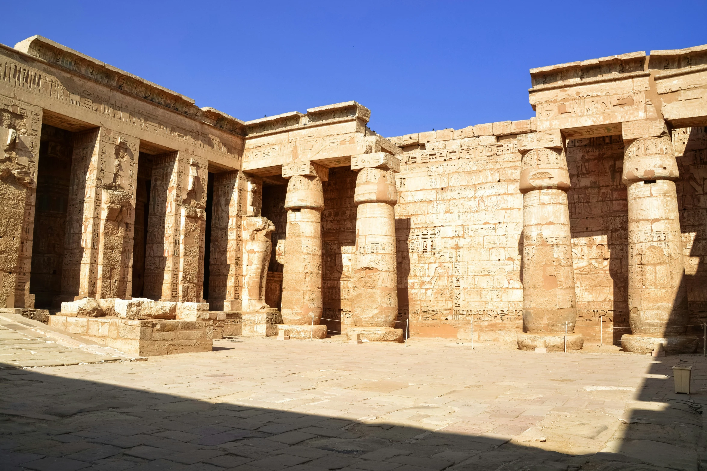 some very ancient buildings on display at an archeological site