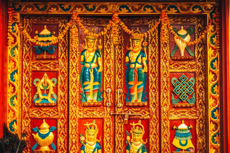 colorful paneled doors inside of an oriental building