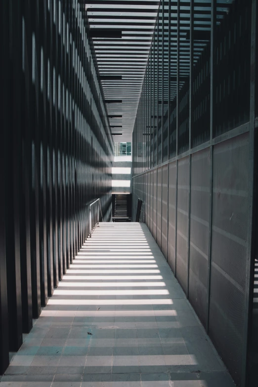 a hallway with several black lines in the center