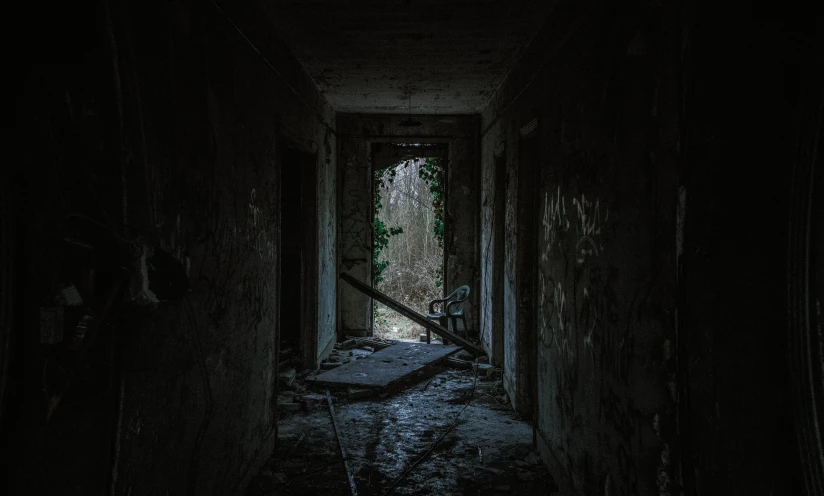 dark room with a small door open