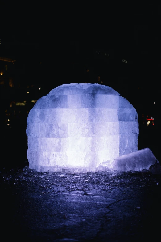 a big piece of ice sitting in the middle of a street