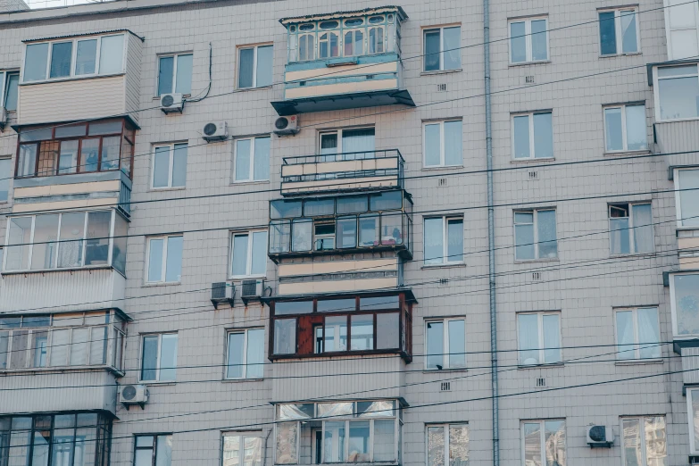 an old building with multiple balconies and windows