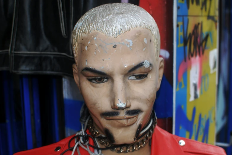 a man's face is painted to look like he has no hair