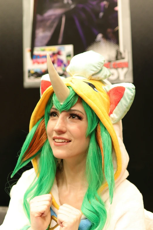 a woman with green hair wearing a costume