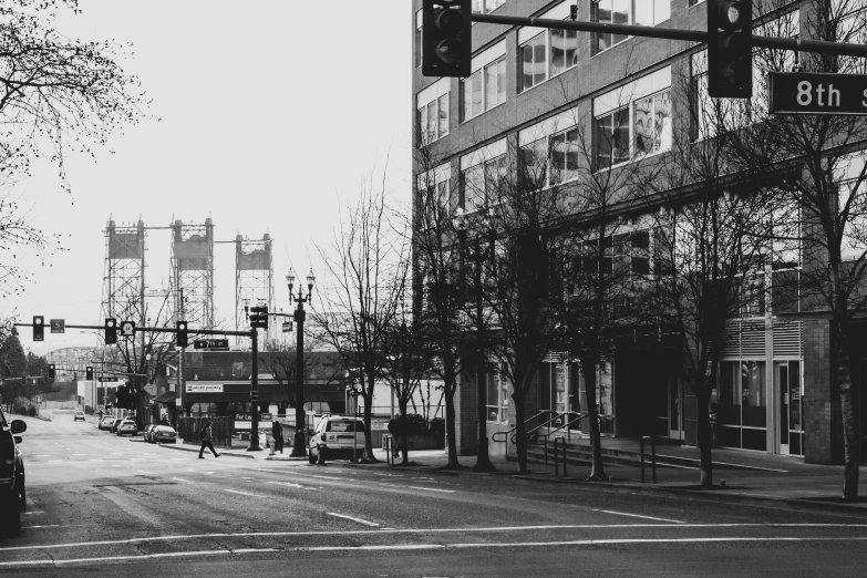 a black and white po of a street with a lot of buildings